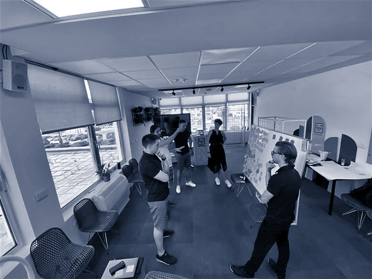 Team collaborating in a workshop room